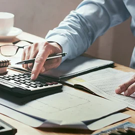 Man using calculator